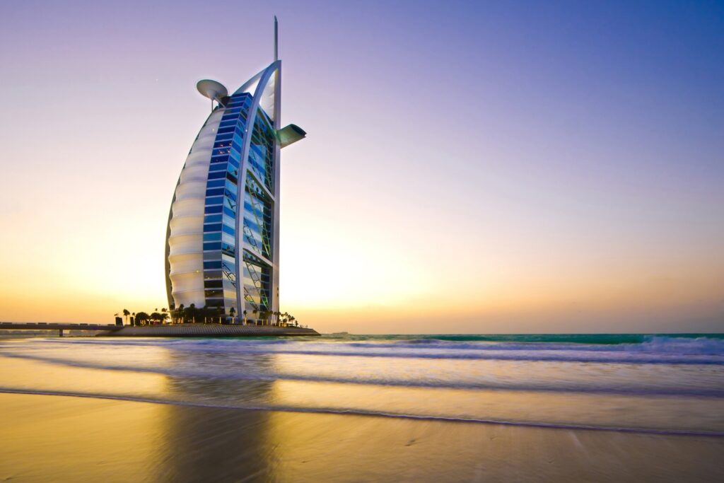burj al arab with sunset behind